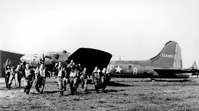 The jubilant crew of the Memphis Belle leaves the bomber after their final mission (US Air Force)